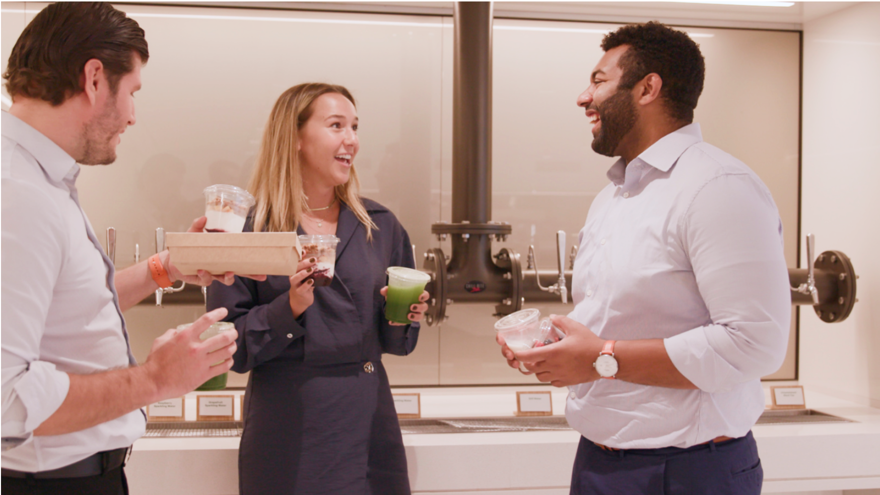 Employees having coffee together